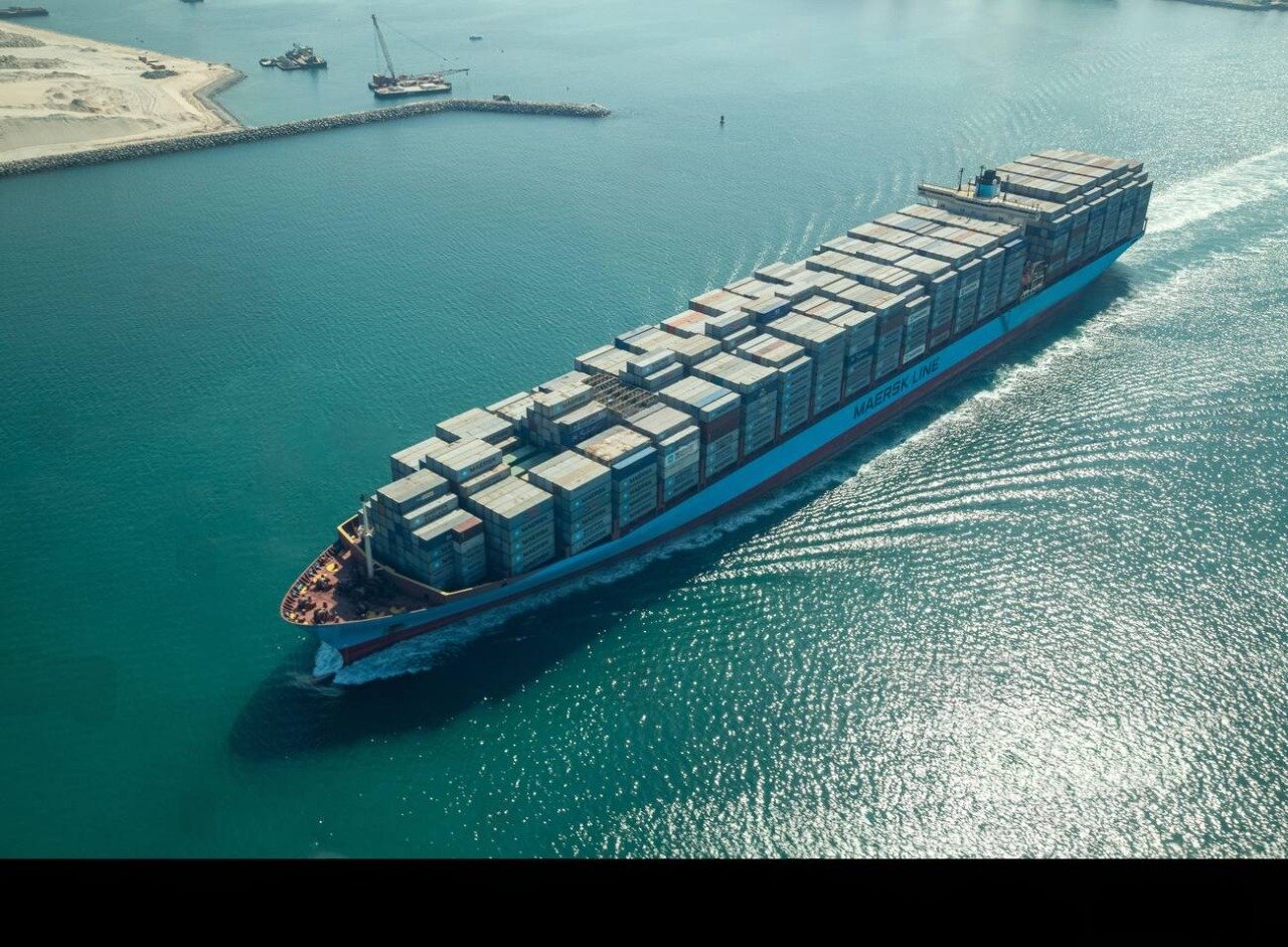 Dubai skyline with bustling port activity, symbolizing the city’s booming trade and strong real estate market.